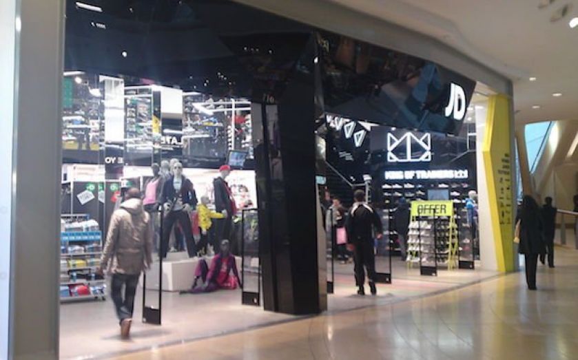 Athleisure giant JD Sports said it was trading in line with its lowered expectations, as the firm pins its hopes on an improved consumer outlook for the year ahead. 