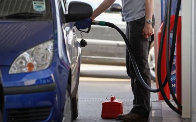 The two brothers behind a huge deal to buy Asda have sold a stake in their petrol station business worth millions.