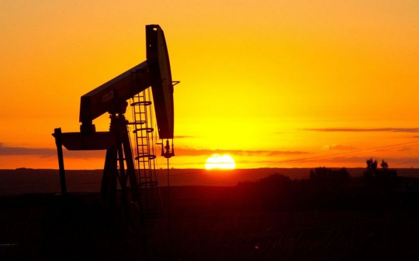 Oil prices are on track for their biggest daily fall in two weeks after a combination of a record build in stocks and the Federal Reserve’s economic predictions spooked traders.