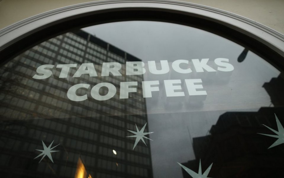 Starbucks UK has outlined plans to open 100 new stores as it delivered strong trading in the face of a weak consumer market. 