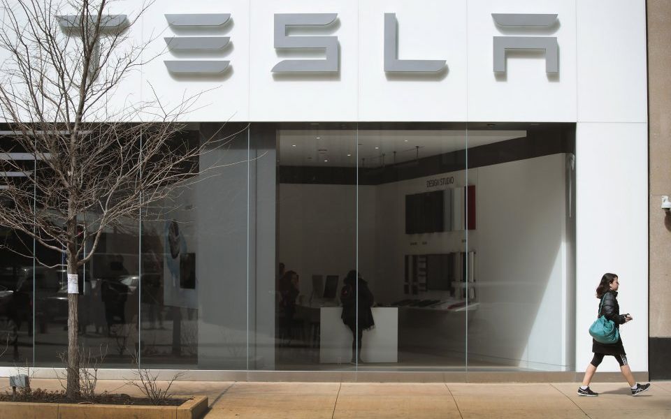 Tesla shares fall after Elon Musk's company confirms huge quarterly ...