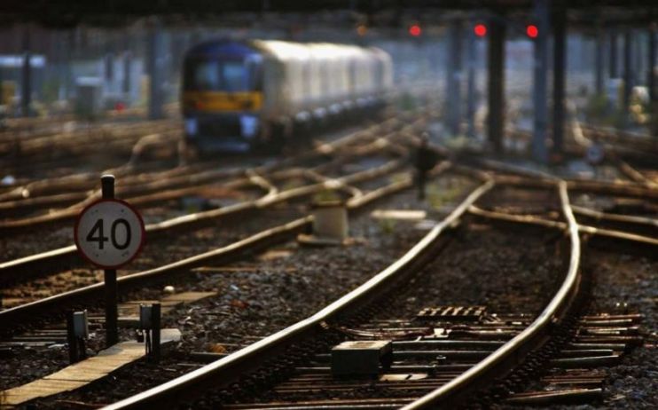 The government will run an auction of phone lines running alongside Britain's railway lines in a move that could raise up to &pound;1bn.