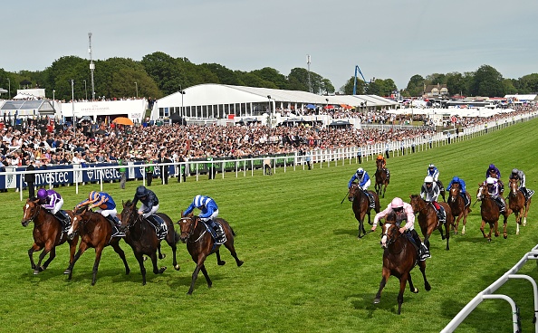 Jockey Seamie Heffernan rides Anthony Van Dyck (R) to victory in the Derby Stakes on the second day of the Epsom Derby Festival in Surrey, southern England on June 1, 2019. - Anthony van Dyck gave trainer Aidan O'Brien a record-equalling seventh winner in the Epsom Derby on Saturday. The 49-year-old Irishman had seven runners in this year's edition of English flat racing's premier event (Photo by Glyn KIRK / AFP)        (Photo credit should read GLYN KIRK/AFP/Getty Images)