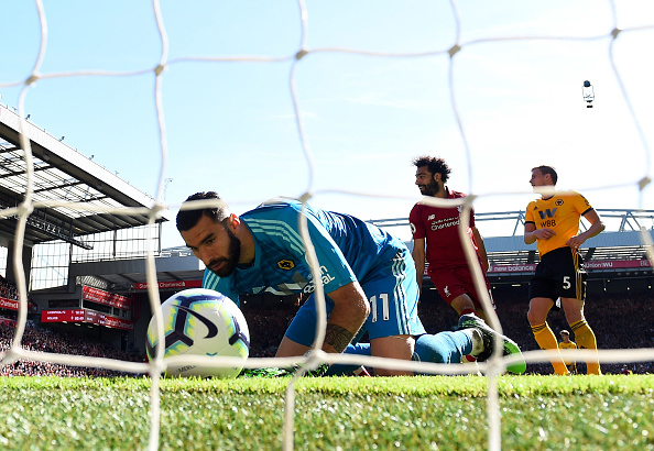 LIVERPOOL, ENGLAND - MAY 12: Rui Patricio of Wolverhampton Wanderers reacts as Sadio Mane of Liverpool (not pictured) scores his team's second goal during the Premier League match between Liverpool FC and Wolverhampton Wanderers at Anfield on May 12, 2019 in Liverpool, United Kingdom. (Photo by Laurence Griffiths/Getty Images)