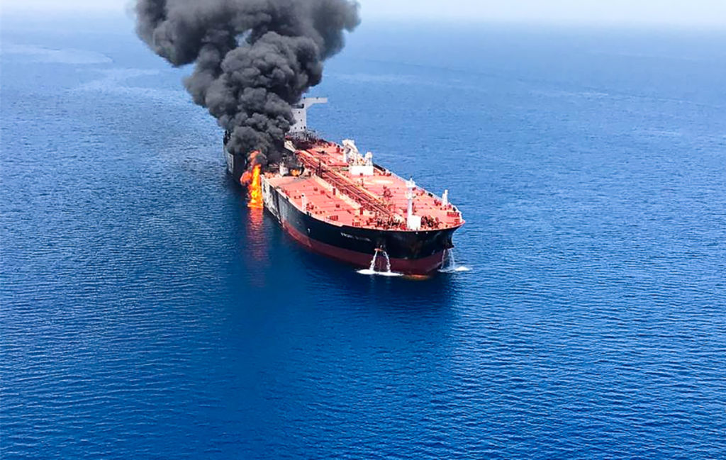 A picture obtained by AFP from Iranian News Agency ISNA on June 13, 2019 reportedly shows fire and smoke billowing from Norwegian owned Front Altair tanker said to have been attacked in the waters of the Gulf of Oman. - Suspected attacks left two tankers in flames in the waters of the Gulf of Oman today, sending world oil prices soaring as Iran helped rescue stricken crew members. The mystery incident, the second involving shipping in the strategic sea lane in only a few weeks, came amid spiralling tensions between Tehran and Washington, which has pointed the finger at Iran over earlier tanker attacks in May. (Photo by - / ISNA / AFP)        (Photo credit should read -/AFP/Getty Images)