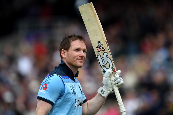 England's captain Eoin Morgan acknowledges the crowd as he walks back the pavilion after losing his wicket for 148 runs during the 2019 Cricket World Cup group stage match between England and Afghanistan at Old Trafford in Manchester, northwest England, on June 18, 2019. (Photo by Dibyangshu SARKAR / AFP) / RESTRICTED TO EDITORIAL USE        (Photo credit should read DIBYANGSHU SARKAR/AFP/Getty Images)