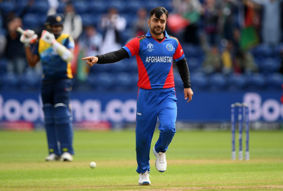 CARDIFF, WALES - JUNE 04: Rashid Khan of Afghanistan celebrates taking the wicket of Nuwan Pradeep of Sri Lanka during the Group Stage match of the ICC Cricket World Cup 2019 between Afghanistan and Sri Lanka at Cardiff Wales Stadium on June 04, 2019 in Cardiff, Wales. (Photo by Alex Davidson/Getty Images)