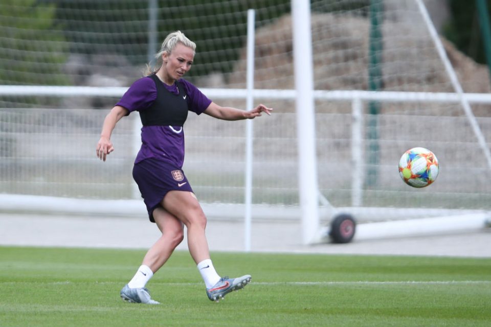 DEAUVILLE, FRANCE - JUNE 13: Toni Duggan passes the ball during an England training session during the 2019 FIFA Women's World Cup France at Stade Commandante Hebert on June 13, 2019 in Deauville, France. (Photo by Alex Grimm/Getty Images)