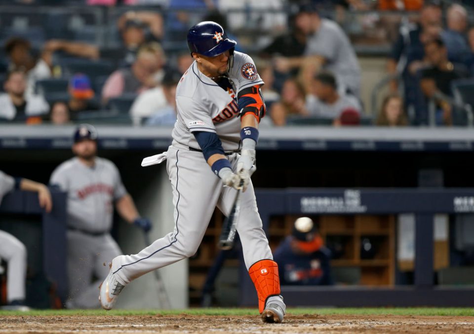 NEW YORK, NEW YORK - JUNE 21:   Yuli Gurriel #10 of the Houston Astros connects on a double in the sixth inning against the New York Yankees at Yankee Stadium on June 21, 2019 in New York City. (Photo by Jim McIsaac/Getty Images)