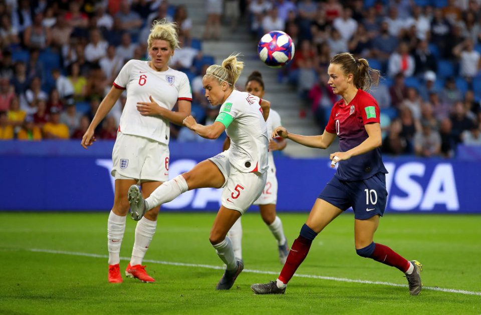 LE HAVRE, FRANCE - JUNE 27:  Steph Houghton of England clears the ball under pressure from Caroline Graham Hansen of Norway during the 2019 FIFA Women's World Cup France Quarter Final match between Norway and England at Stade Oceane on June 27, 2019 in Le Havre, France. (Photo by Richard Heathcote/Getty Images)