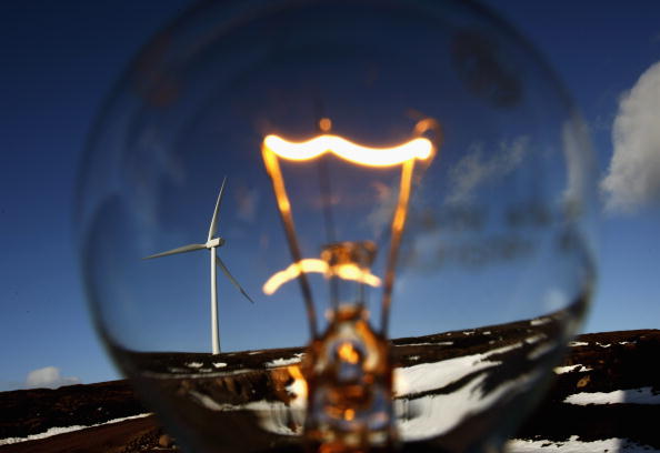 STIRLING, UNITED KINGDOM - FEBRUARY 14:  In this photo illustration wind turbines are seen through a light bulb at the Braes of Doune windfarm February 14, 2007 in Stirling, Scotland. The government has set a target for 10% of electricity to be generated from renewable sources by 2010.  (Photo by Jeff J Mitchell/Getty Images)