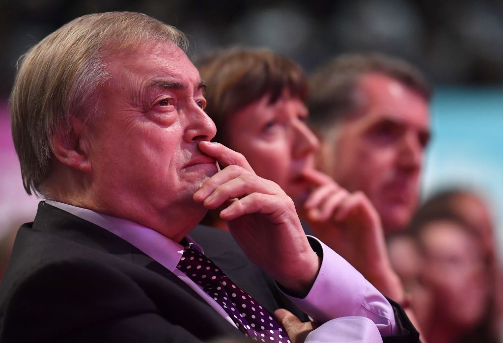 Former deputy leader of the Labour Party, John Prescott, listens as Britain's main opposition Labour party leader Jeremy Corbyn delivers a speech on the final day of the Labour Party Conference in Brighton on September 27, 2017. / AFP PHOTO / Ben STANSALL        (Photo credit should read BEN STANSALL/AFP/Getty Images)