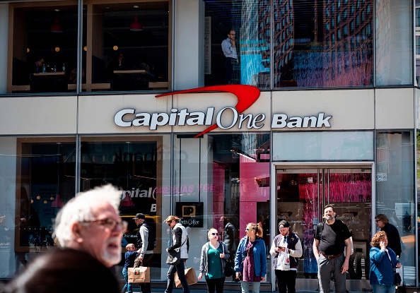 "Our acquisition of Discover is a singular opportunity to bring together two very successful companies with complementary capabilities and franchises, and to build a payments network that can compete with the largest payments networks and payments companies," said Richard Fairbank, founder, chairman and chief executive officer of Capital One said. (JOHANNES EISELE/AFP/Getty Images)