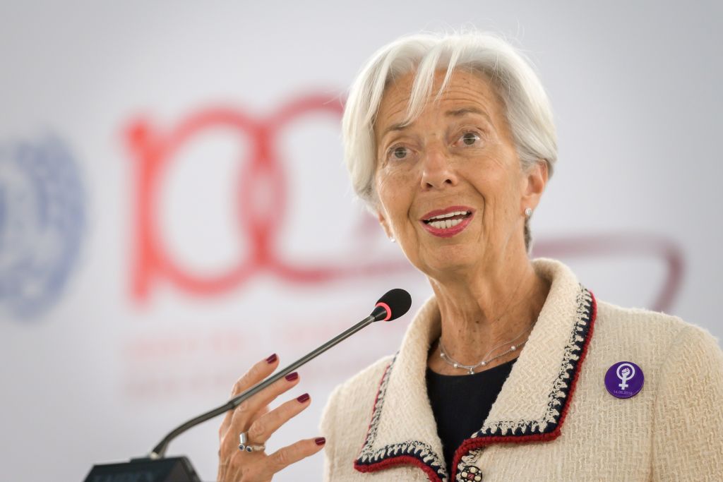 International Monetary Fund (IMF) Managing Director Christine Lagarde holds a pins in solidarity whith a Swiss nation-wide women's strike for wage parity during her speech at the ILO International Labour Conference on June 14, 2019 in Geneva. (Photo by FABRICE COFFRINI / AFP)        (Photo credit should read FABRICE COFFRINI/AFP/Getty Images)