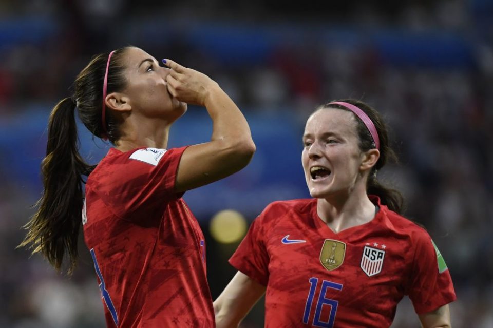 United States' forward Alex Morgan (L) celebrates after scoring a goal during the France 2019 Women's World Cup semi-final football match between England and USA, on July 2, 2019, at the Lyon Satdium in Decines-Charpieu, central-eastern France. (Photo by Philippe DESMAZES / AFP)        (Photo credit should read PHILIPPE DESMAZES/AFP/Getty Images)