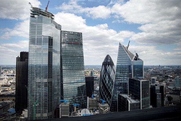 Skyscraper office blocks, including Tower 42 (L), the Leadenhall Building, commonly called the "Cheesegrater" (C), 30 St Mary Axe commonly called the "Gherkin" (centre R), and 5254 Lime Street, commonly called the "Scalpel" (R) are pictured from inside the Sky Garden in London on July 3, 2019. (Photo by Tolga Akmen / AFP) (Photo credit should read TOLGA AKMEN/AFP/Getty Images)