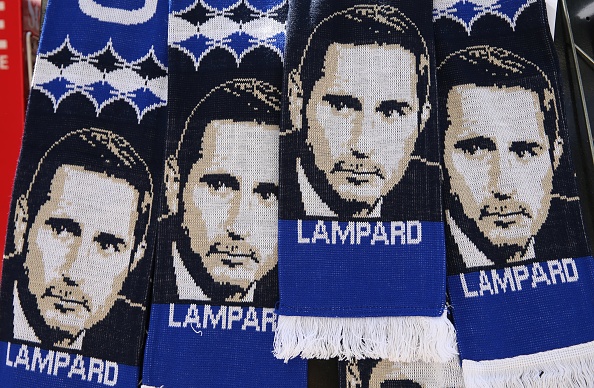 Scarves featuring the image of Chelsea's newly appointed English head coach Frank Lampard are pictured ahead of his unveiling press conference at Stamford Bridge in London on July 4, 2019. - Frank Lampard was appointed Chelsea head coach on Thursday, confirming a dramatic return for one of the club's greatest ever players. Lampard has signed a three-year contract with the Premier League club, where he spent 13 years and became the team's all-time leading scorer with 211 goals. (Photo by ISABEL INFANTES / AFP)        (Photo credit should read ISABEL INFANTES/AFP/Getty Images)