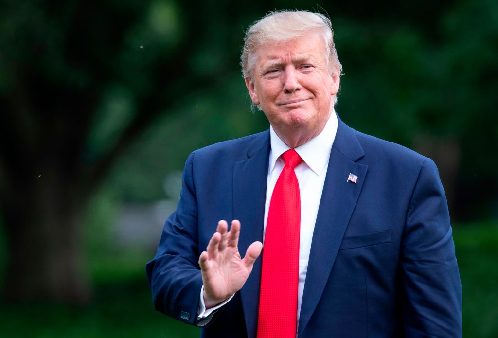 US President Donald Trump waves as he returns to the White House in Washington, DC on July 7, 2019. - Trump is returning to Washington after spending the weekend at his Bedminster golf resort. (Photo by Alex Edelman / AFP)        (Photo credit should read ALEX EDELMAN/AFP/Getty Images)