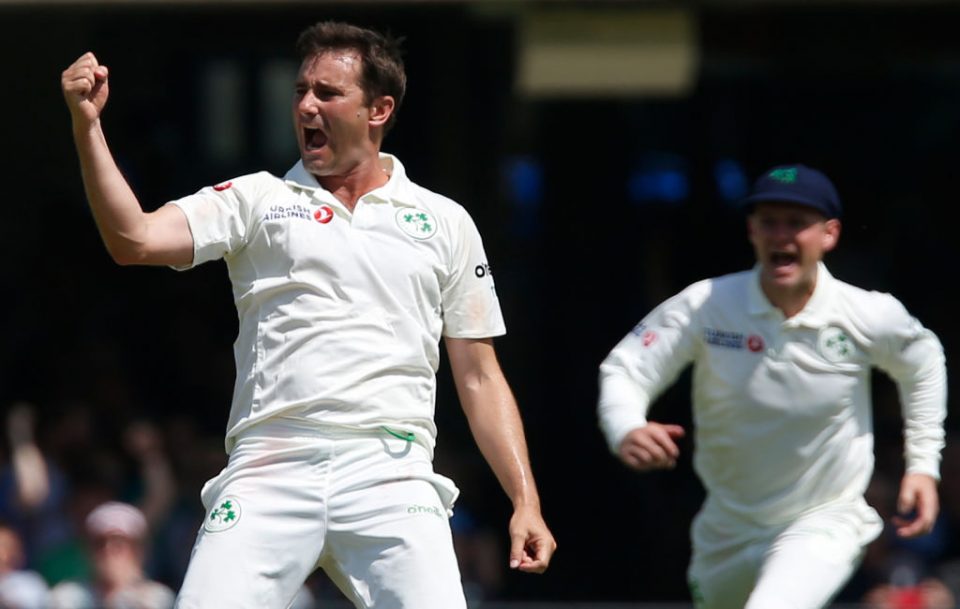 Ireland's Tim Murtagh celebrates taking the wicket of England's Chris Woakes on the first day of the first cricket Test match between England and Ireland at Lord's cricket ground in London on July 24, 2019. (Photo by Ian KINGTON / AFP) / RESTRICTED TO EDITORIAL USE. NO ASSOCIATION WITH DIRECT COMPETITOR OF SPONSOR, PARTNER, OR SUPPLIER OF THE ECB (Photo credit should read IAN KINGTON/AFP/Getty Images)