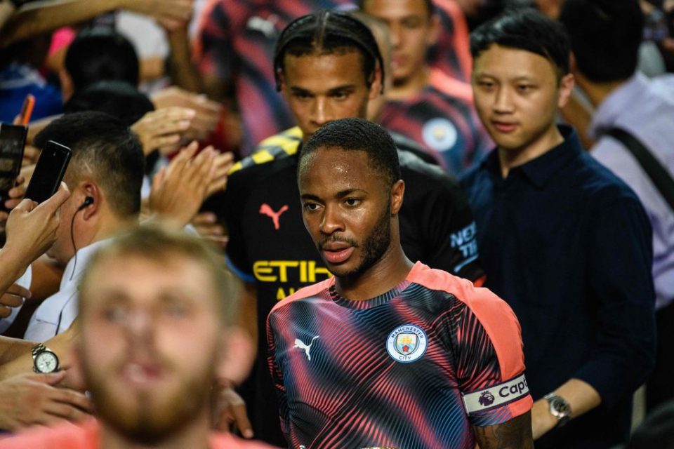 Manchester City's British forward  Raheem Sterling (C) leaves the podium with his teammates  at the end of the friendly football match between English Premier League club Manchester City and Hong Kong's Kitchee at the Hong Kong Stadium, in Hong Kong on July 24, 2019. (Photo by Anthony WALLACE / AFP)        (Photo credit should read ANTHONY WALLACE/AFP/Getty Images)