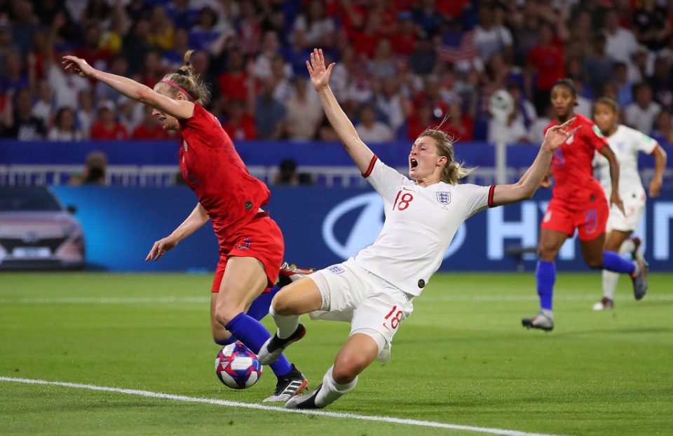 LYON, FRANCE - JULY 02: Ellen White of England is fouled by Becky Sauerbrunn of the USA inside the penalty area, which leads to England being awarded a penalty following a VAR review during the 2019 FIFA Women's World Cup France Semi Final match between England and USA at Stade de Lyon on July 02, 2019 in Lyon, France. (Photo by Richard Heathcote/Getty Images)