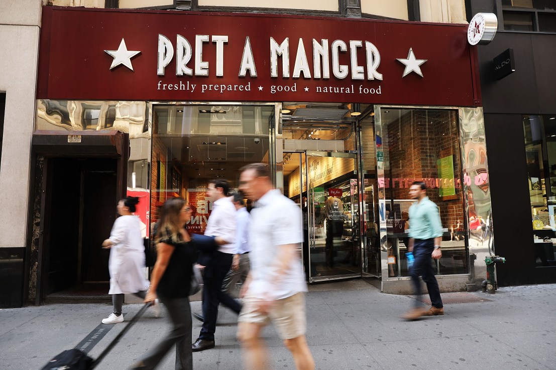 People walk by a Pret A Manger food chain 