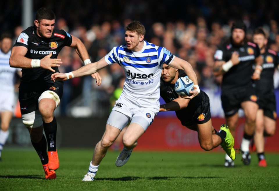 EXETER, ENGLAND - MARCH 24:  Ruaridh McConnochie of Bath Rugby evades Olly Woodburn of Exeter Chiefs during the Gallagher Premiership Rugby match between Exeter Chiefs and Bath Rugby at Sandy Park on March 24, 2019 in Exeter, United Kingdom. (Photo by Dan Mullan/Getty Images)