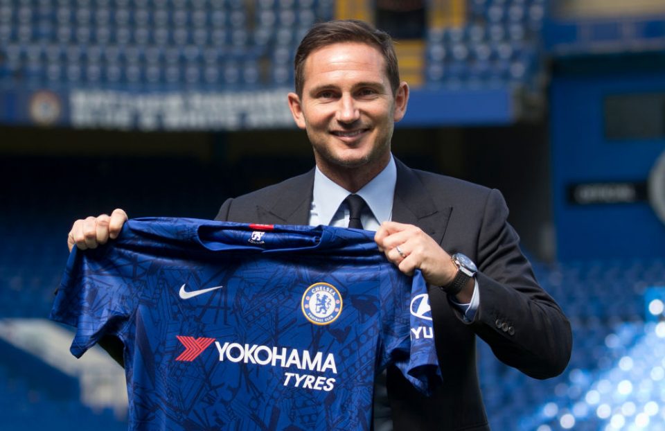 Chelsea's newly appointed English head coach Frank Lampard poses for the press at Stamford Bridge in London on July 4, 2019. - Frank Lampard was appointed Chelsea head coach today, confirming a dramatic return for one of the club's greatest ever players. Lampard has signed a three-year contract with the Premier League club, where he spent 13 years and became the team's all-time leading scorer with 211 goals. (Photo by Isabel Infantes / AFP)        (Photo credit should read ISABEL INFANTES/AFP/Getty Images)