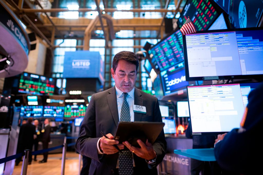 Traders work after the opening bell at the New York Stock Exchange (NYSE) on July 29, 2019 located at Wall Street in New York City. - Wall Street stocks were mostly lower early Monday at the start of a week jammed with news, including a Federal Reserve decision and Apple results. (Photo by Johannes EISELE / AFP)        (Photo credit should read JOHANNES EISELE/AFP/Getty Images)