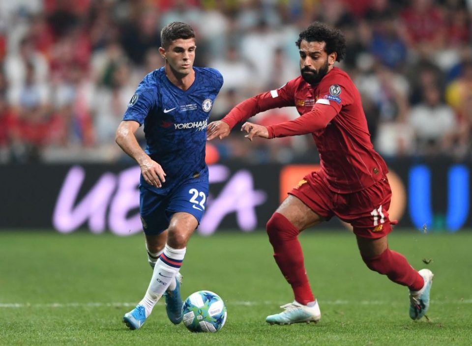 Chelsea's US midfielder Christian Pulisic (L) vies for the ball with Liverpool's Egyptian midfielder Mohamed Salah during the UEFA Super Cup 2019 football match between FC Liverpool and FC Chelsea at Besiktas Park Stadium in Istanbul on August 14, 2019. (Photo by OZAN KOSE / AFP)        (Photo credit should read OZAN KOSE/AFP/Getty Images)