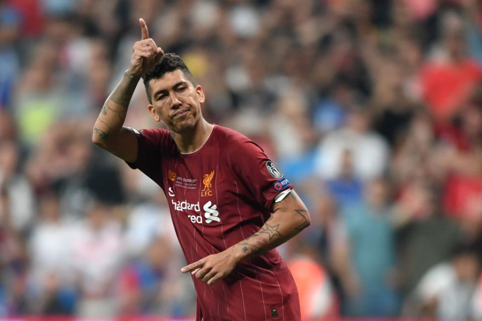 Liverpool's Brazilian midfielder Roberto Firmino scores during the penalty shoot-out at the UEFA Super Cup 2019 football match between FC Liverpool and FC Chelsea at Besiktas Park Stadium in Istanbul on August 14, 2019. (Photo by OZAN KOSE / AFP)        (Photo credit should read OZAN KOSE/AFP/Getty Images)