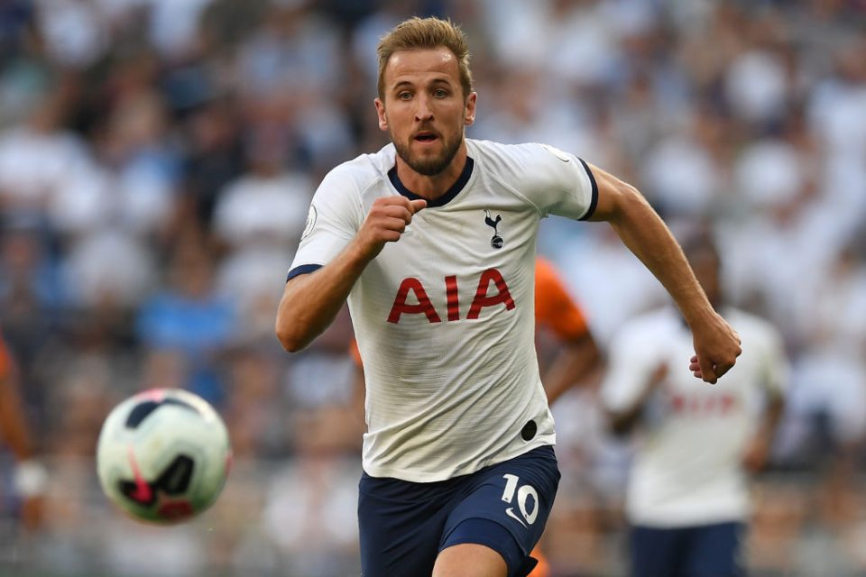 Tottenham Hotspur's English striker Harry Kane chases the ball during the English Premier League football match between Tottenham Hotspur and Newcastle United at Tottenham Hotspur Stadium in London, on August 25, 2019. (Photo by Daniel LEAL-OLIVAS / AFP) / RESTRICTED TO EDITORIAL USE. No use with unauthorized audio, video, data, fixture lists, club/league logos or 'live' services. Online in-match use limited to 120 images. An additional 40 images may be used in extra time. No video emulation. Social media in-match use limited to 120 images. An additional 40 images may be used in extra time. No use in betting publications, games or single club/league/player publications. /         (Photo credit should read DANIEL LEAL-OLIVAS/AFP/Getty Images)