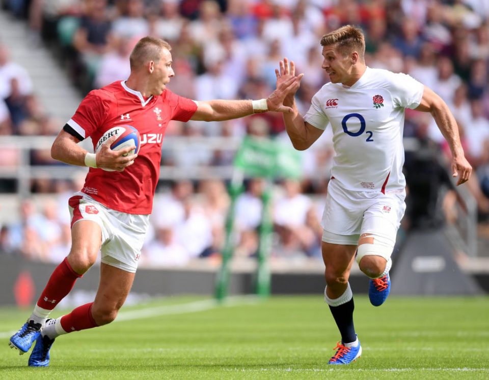 LONDON, ENGLAND - AUGUST 11: Liam Williams of Wales tries to hold off Piers Francis of England during the 2019 Quilter International match between England and Wales at Twickenham Stadium on August 11, 2019 in London, England. (Photo by Laurence Griffiths/Getty Images)