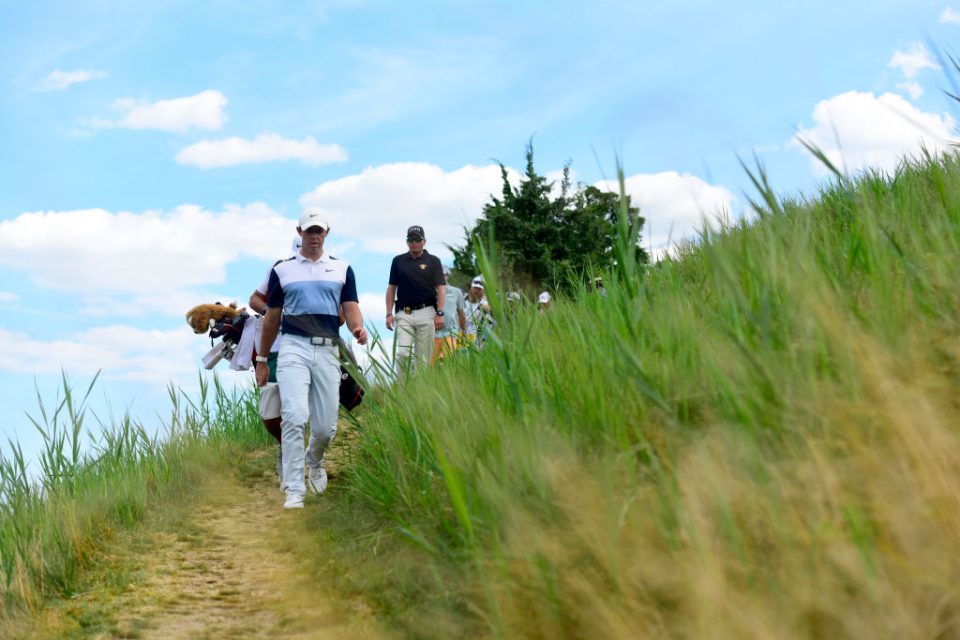 JERSEY CITY, NEW JERSEY - AUGUST 11: Rory McIlroy of Northern Ireland walks from the 12th tee during the final round of The Northern Trust at Liberty National Golf Club on August 11, 2019 in Jersey City, New Jersey. (Photo by Jared C. Tilton/Getty Images)