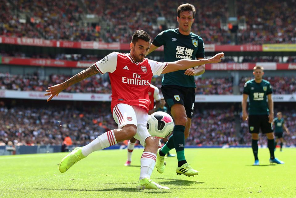 LONDON, ENGLAND - AUGUST 17:  Dani Ceballos of Arsenal battles with Jack Cork of Burnley during the Premier League match between Arsenal FC and Burnley FC at Emirates Stadium on August 17, 2019 in London, United Kingdom. (Photo by Julian Finney/Getty Images)
