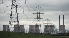 A general view shows pylons and Ferrybridge C power station, owned by energy company SSE, which is set to stop generating and close in March 2016, near Knottingley, northern England, on May 24, 2015. The coal-fired powerstation went online in 1966. AFP PHOTO / OLI SCARFF (Photo credit should read OLI SCARFF/AFP/Getty Images)