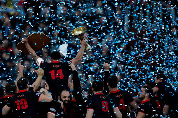 TBILISI, GEORGIA - MARCH 15: Captain, Irakli Abuseridze of Georgia celebrates victory and top spot in the group with the trophy after the FIRA-AER European Nations Cup Division 1A match between Georgia and Romania at the Mikheil Meskhi Stadium on March 15, 2014 in Tbilisi, Georgia. (Photo by Dean Mouhtaropoulos/Getty Images)