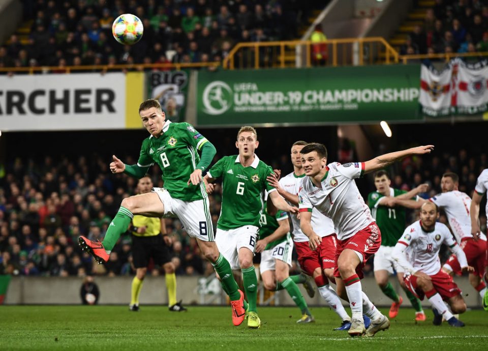 BELFAST, NORTHERN IRELAND - MARCH 24: Steve Davis of Northern Ireland and Yuri Kovalev of Belarus during the 2020 UEFA European Championships group C qualifying match between Northern Ireland and Belarus at Windsor Park on March 24, 2019 in Belfast, United Kingdom. (Photo by Charles McQuillan/Getty Images)