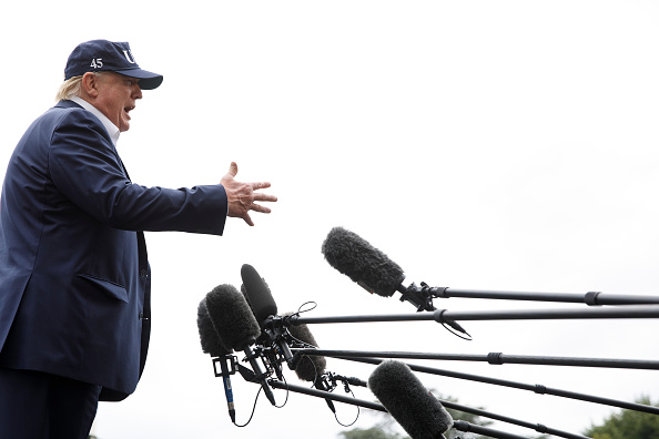 Donald Trump says China talks going well and turns fire on EU