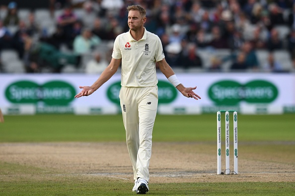 England's Stuart Broad reacts during the fourth day of the fourth Ashes cricket Test match between England and Australia at Old Trafford in Manchester, north-west England on September 7, 2019. (Photo by Oli SCARFF / AFP) / RESTRICTED TO EDITORIAL USE. NO ASSOCIATION WITH DIRECT COMPETITOR OF SPONSOR, PARTNER, OR SUPPLIER OF THE ECB        (Photo credit should read OLI SCARFF/AFP/Getty Images)