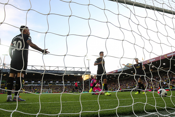 NORWICH, ENGLAND - SEPTEMBER 14: John Stones reacts toward Nicolas Otamendi of Manchester City after a mistake in defence allows Teemu Pukki of Norwich City to score their 3rd goal during the Premier League match between Norwich City and Manchester City at Carrow Road on September 14, 2019 in Norwich, United Kingdom. (Photo by Marc Atkins/Getty Images)