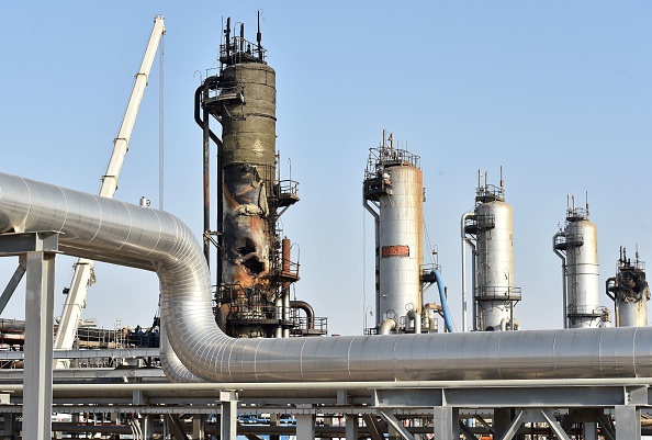 A damaged installation in Saudi Arabia's Abqaiq oil processing plant is pictured on September 20, 2019. - Saudi Arabia said on September 17 its oil output will return to normal by the end of September, seeking to soothe rattled energy markets after attacks on two instillations that slashed its production by half. The strikes on Abqaiq - the world's largest oil processing facility - and the Khurais oil field in eastern Saudi Arabia roiled energy markets and revived fears of a conflict in the tinderbox Gulf region. (Photo by Fayez Nureldine / AFP)        (Photo credit should read FAYEZ NURELDINE/AFP/Getty Images)