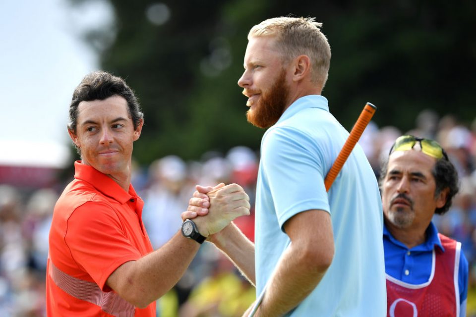 CRANS-MONTANA, SWITZERLAND - SEPTEMBER 01: Rory McIlroy of Northern Ireland shakes hands with Sebastian Soderberg of Sweden on the eighteenth during Day Four of the Omega European Masters at Crans Montana Golf Club on September 01, 2019 in Crans-Montana, Switzerland. (Photo by Stuart Franklin/Getty Images)