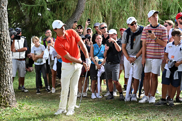 CRANS-MONTANA, SWITZERLAND - SEPTEMBER 01: Rory McIlroy of Northern Ireland plays a shot in the rough on the eighteenth during Day Four of the Omega European Masters at Crans Montana Golf Club on September 01, 2019 in Crans-Montana, Switzerland. (Photo by Stuart Franklin/Getty Images)