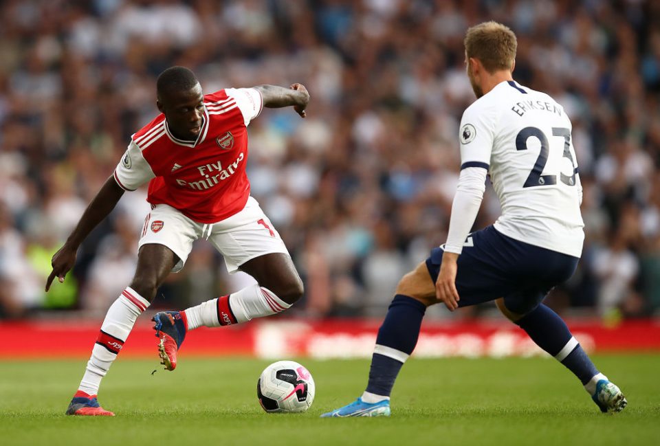 LONDON, ENGLAND - SEPTEMBER 01:  Nicolas Pepe of Arsenal runs at Christian Eriksen of Spurs during the Premier League match between Arsenal FC and Tottenham Hotspur at Emirates Stadium on September 01, 2019 in London, United Kingdom. (Photo by Julian Finney/Getty Images)