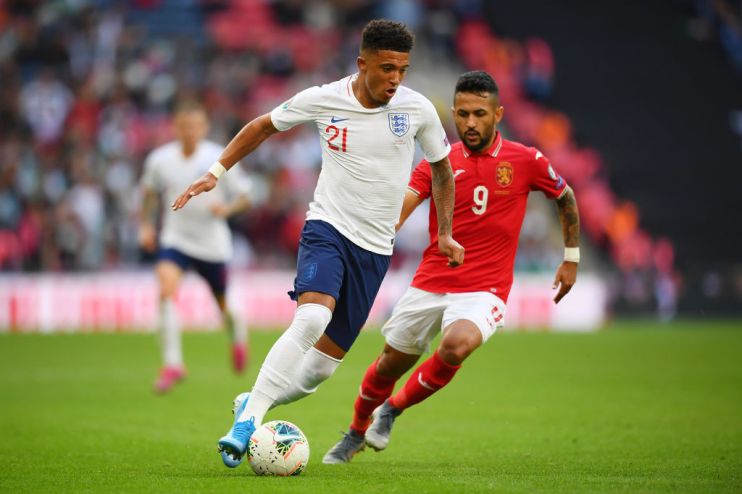 LONDON, ENGLAND - SEPTEMBER 07: Jadon Sancho of England controls the ball as Wanderson of Bulgaria looks on during the UEFA Euro 2020 qualifier match between England and Bulgaria at Wembley Stadium on September 07, 2019 in London, England. (Photo by Clive Mason/Getty Images)