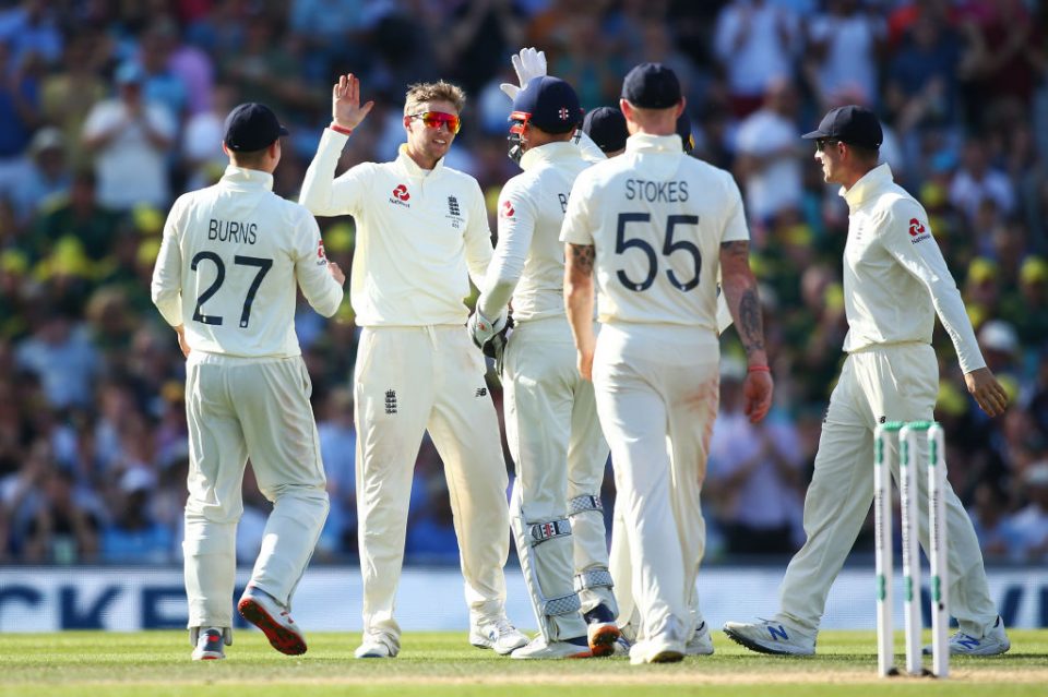 LONDON, ENGLAND - SEPTEMBER 15: Joe Root of England celebrates with his teammates after dismissing Mitchell Marsh of Australia during day four of the 5th Specsavers Ashes Test between England and Australia at The Kia Oval on September 15, 2019 in London, England. (Photo by Jordan Mansfield/Getty Images for Surrey CCC)