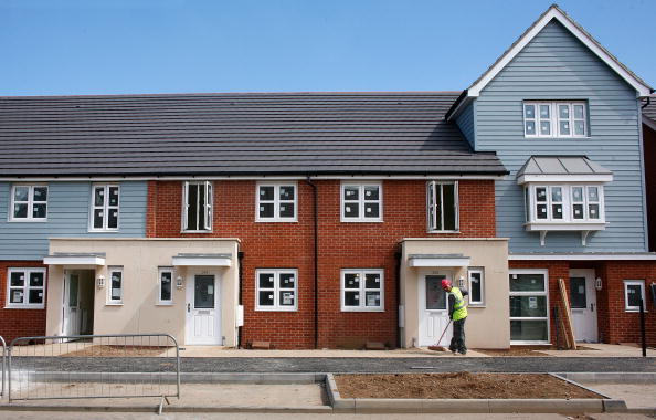SLOUGH, UNITED KINGDOM - JULY 01: A Barratt homes new-build site under construction on July 1, 2008 in Slough, England. New build housing companies are struggling during the current credit crunch, as people find it increasingly diifficult to buy, sell and get a good mortgage deal that suits their needs. (Photo by Cate Gillon/Getty Images)