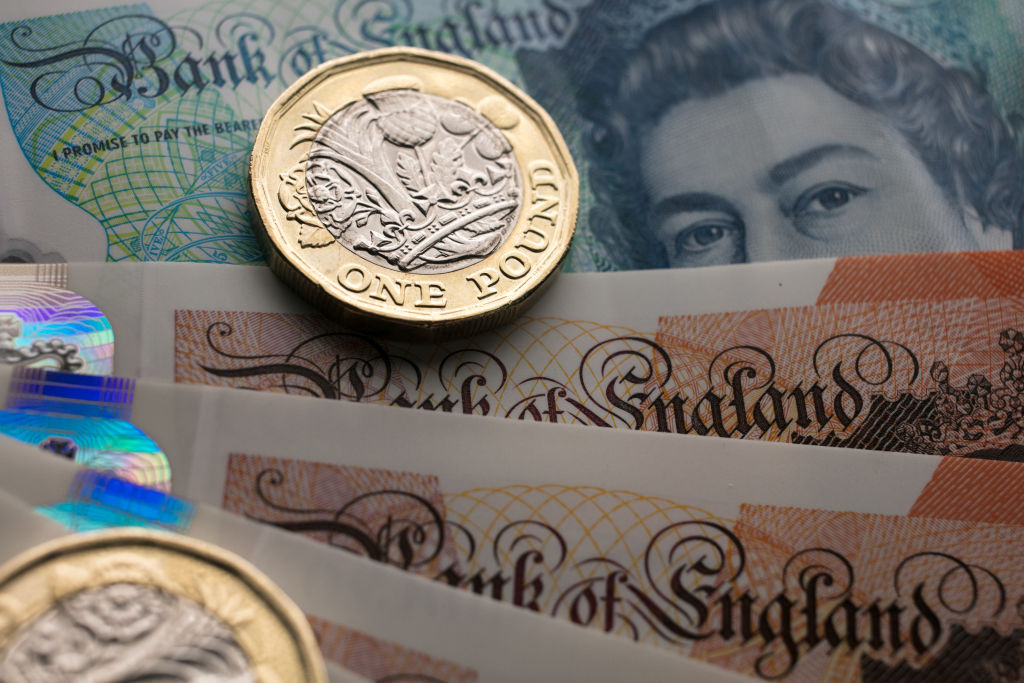 BATH, ENGLAND - OCTOBER 13:  In this photo illustration, £1 coins are seen with the new £10 note on October 13, 2017 in Bath, England. Currency experts have warned that as the uncertainty surrounding Brexit continues, the value of the British pound, which has remained depressed against the US dollar and the euro since the UK voted to leave in the EU referendum, is likely to fluctuate.  (Photo Illustration by Matt Cardy/Getty Images)