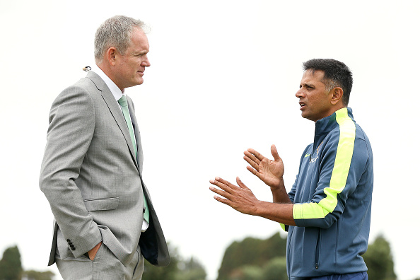 TAURANGA, NEW ZEALAND - JANUARY 16:  Commentator Tom Moody speaks to coach Rahul Dravid of India during the ICC U19 Cricket World Cup match between India and Papua New Guinea at Bay Oval on January 16, 2018 in Tauranga, New Zealand.  (Photo by Hagen Hopkins/Getty Images)